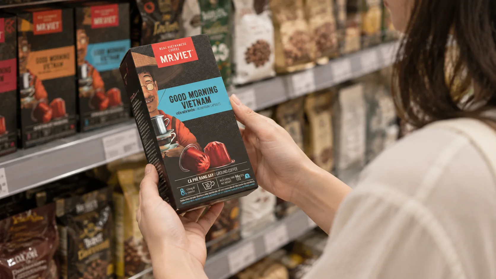 Shopper checking the label of an imported food product in Vietnam